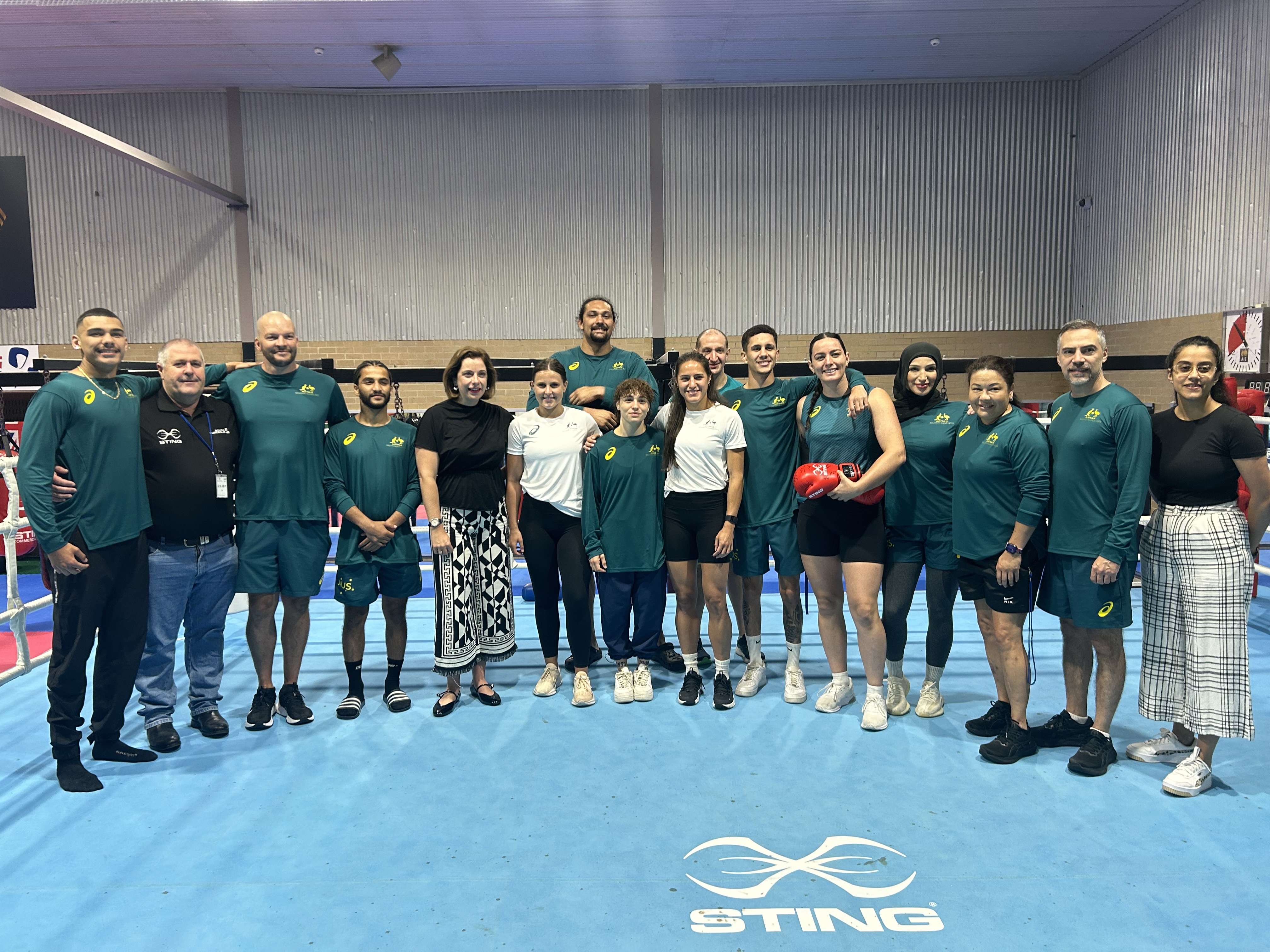Olympian Caitlin Parker with the Minister for Sport and members of the Australian Boxing team at the AIS