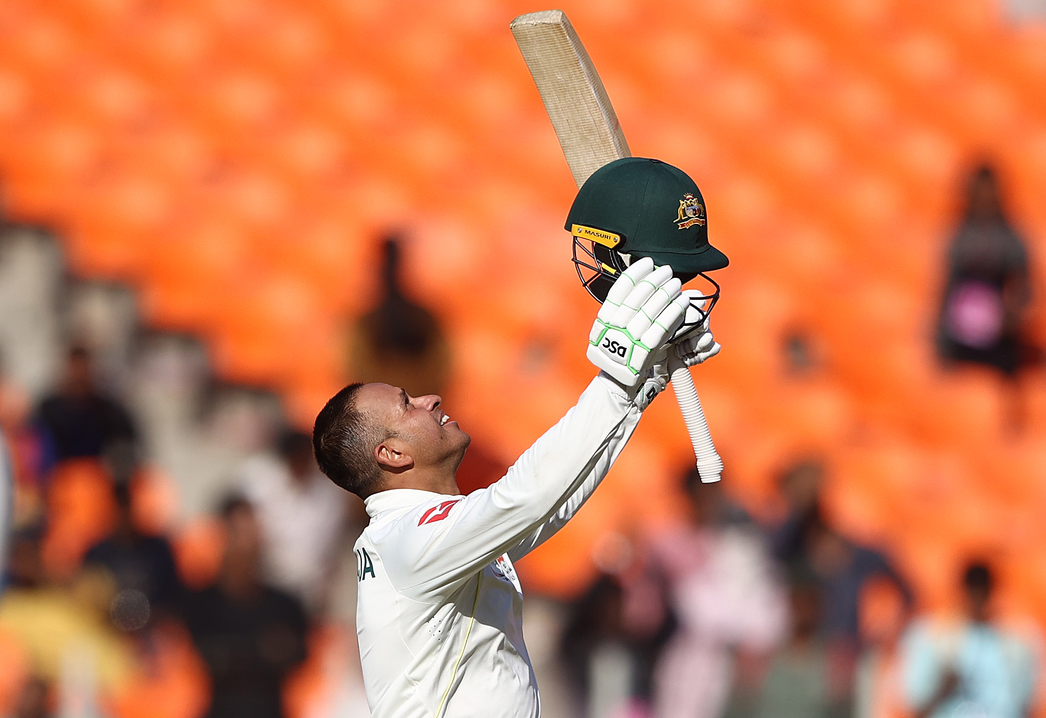Australian cricketer Usman Khawaja celebrates test century
